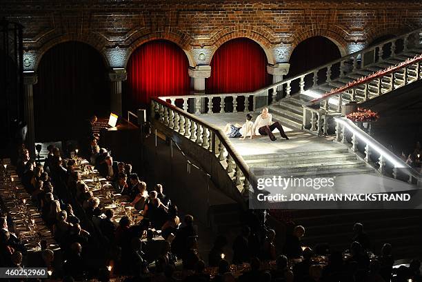 Dancers perform at the traditional Nobel Prize banquet at the Stockholm City Hall on December 10, 2014 following the Nobel Prize award ceremonies for...