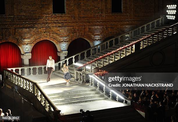 Dancers perform at the traditional Nobel Prize banquet at the Stockholm City Hall on December 10, 2014 following the Nobel Prize award ceremonies for...