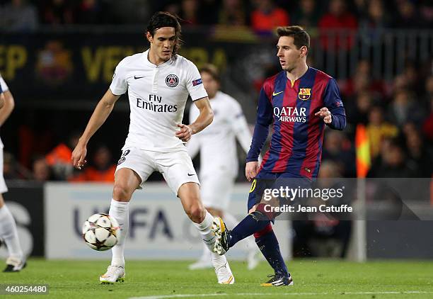 Edinson Cavani of PSG and Lionel Messi of FC Barcelona in action during the UEFA Champions League Group F match between FC Barcelona and Paris...