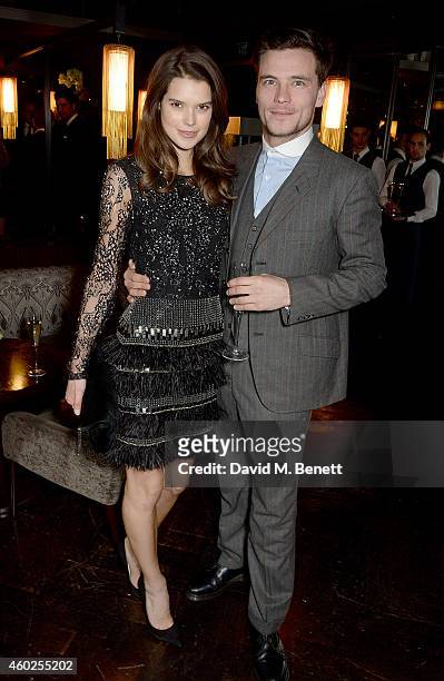 Sarah Ann Macklin and guest attend a private dinner celebrating the opening of the OMEGA Oxford Street boutique at Aqua Shard on December 10, 2014 in...