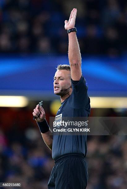 Norwegian referee Svein Oddvar Moen is pictured during the UEFA Champions League group G football match at Stamford Bridge in London on December 10,...