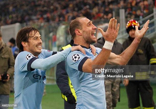 Pablo Zabaleta and David Silva of Manchester City celebrate the second goal during the UEFA Champions League Group E match between AS Roma and...