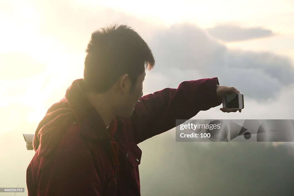 Boy taking picture