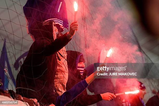 Schalke's fans celebrate after a goal during the UEFA Champions League Group G football match between NK Maribor and FC Schalke 04 in Maribor,...