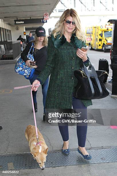 Kirstie Alley and Lillie Price Stevenson seen at LAX on December 10, 2014 in Los Angeles, California.