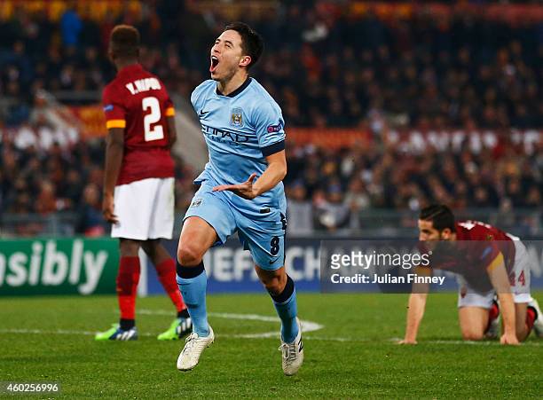 Samir Nasri of Manchester City celebrates as he scores their first goal during the UEFA Champions League Group E match between AS Roma and Manchester...