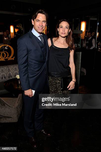 Actors Dougray Scott and Claire Forlani attend the Omega Oxford Street Store Opening Party at The Shard on December 10, 2014 in London, England.