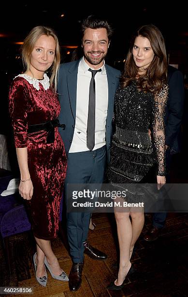 Martha Ward, Dominic Cooper and Sarah Ann Macklin attend a private dinner celebrating the opening of the OMEGA Oxford Street boutique at Aqua Shard...