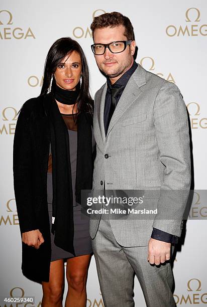 Cristian Contini and guest attend the Omega Oxford Street Store Opening Party at The Shard on December 10, 2014 in London, England.