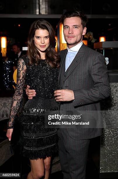 Sarah Ann Macklin and guest attend the Omega Oxford Street Store Opening Party at The Shard on December 10, 2014 in London, England.