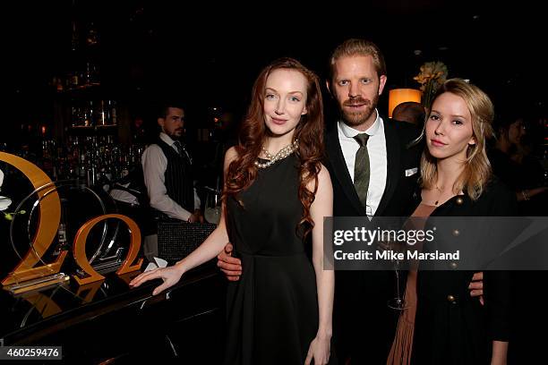 Olivia Grant and Alistair Guy attend the Omega Oxford Street Store Opening Party at The Shard on December 10, 2014 in London, England.