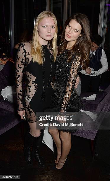 Katia Elizarova and Sarah Ann Macklin attend a private dinner celebrating the opening of the OMEGA Oxford Street boutique at Aqua Shard on December...