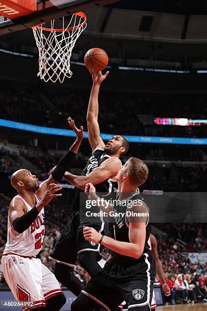 Jerome Jordan of the Brooklyn Nets goes to the basket against the Chicago Bulls on December 10, 2014 at the United Center in Chicago, Illinois. NOTE...