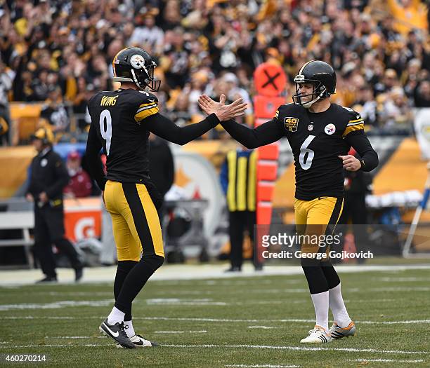 Kicker Shaun Suisham of the Pittsburgh Steelers celebrates with holder Brad Wing after kicking a 49-yard field goal during a game against the New...