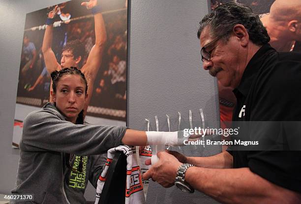 Team Pettis fighter Jessica Penne gets her hands wrapped before facing team Pettis fighter Carla Esparza during filming of season twenty of The...