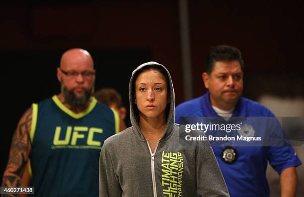 Team Pettis fighter Jessica Penne prepares to enter the octagon before facing team Pettis fighter Carla Esparza during filming of season twenty of...