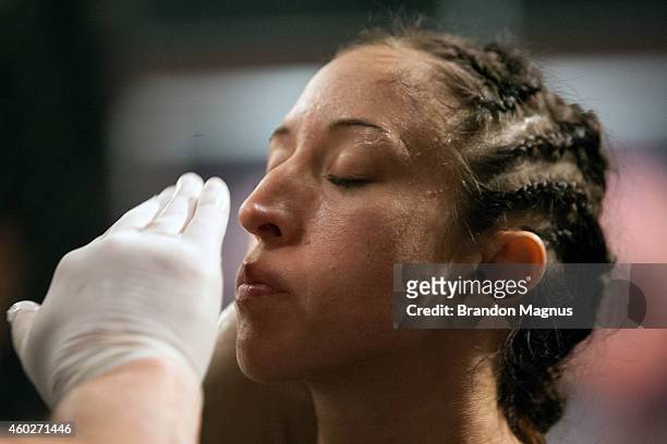 Team Pettis fighter Jessica Penne prepares to enter the octagon before facing team Pettis fighter Carla Esparza during filming of season twenty of...