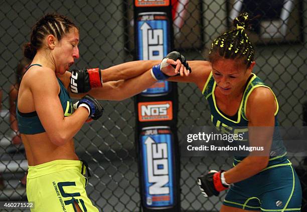 Team Pettis fighter Jessica Penne exchanges punches with team Pettis fighter Carla Esparza during filming of season twenty of The Ultimate Fighter on...