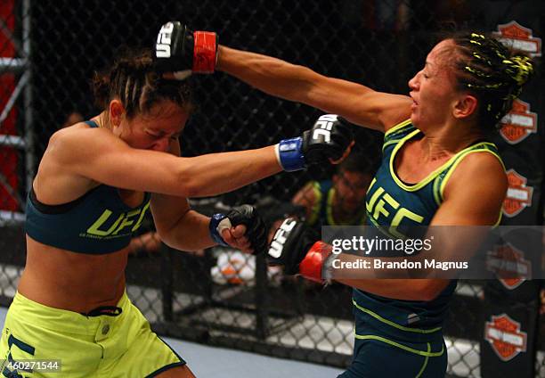 Team Pettis fighter Jessica Penne exchanges punches with team Pettis fighter Carla Esparza during filming of season twenty of The Ultimate Fighter on...