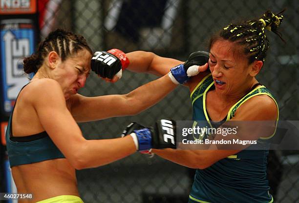 Team Pettis fighter Jessica Penne exchanges punches with team Pettis fighter Carla Esparza during filming of season twenty of The Ultimate Fighter on...