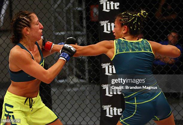 Team Pettis fighter Carla Esparza punches team Pettis fighter Jessica Penne during filming of season twenty of The Ultimate Fighter on August 14,...