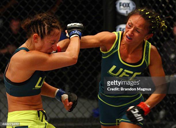 Team Pettis fighter Carla Esparza punches team Pettis fighter Jessica Penne during filming of season twenty of The Ultimate Fighter on August 14,...