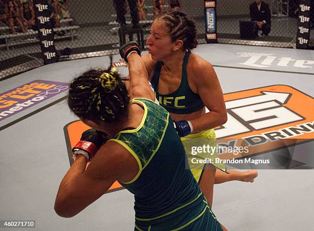 Team Pettis fighter Carla Esparza punches team Pettis fighter Jessica Penne during filming of season twenty of The Ultimate Fighter on August 14,...