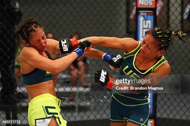 Team Pettis fighter Jessica Penne exchanges punches with team Pettis fighter Carla Esparza during filming of season twenty of The Ultimate Fighter on...