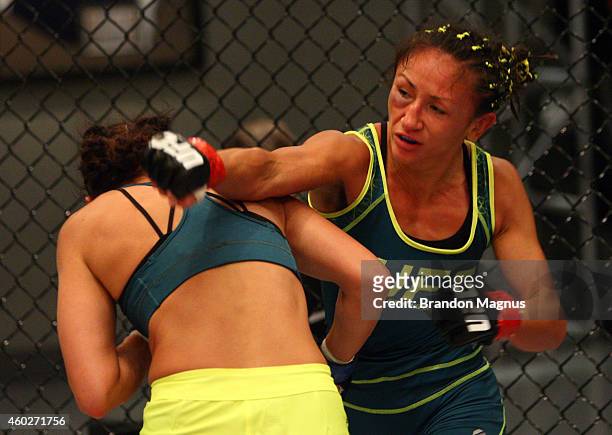 Team Pettis fighter Carla Esparza punches team Pettis fighter Jessica Penne during filming of season twenty of The Ultimate Fighter on August 14,...