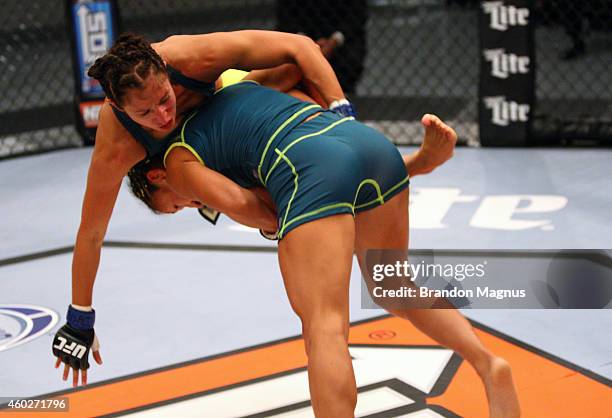 Team Pettis fighter Carla Esparza takes down team Pettis fighter Jessica Penne during filming of season twenty of The Ultimate Fighter on August 14,...