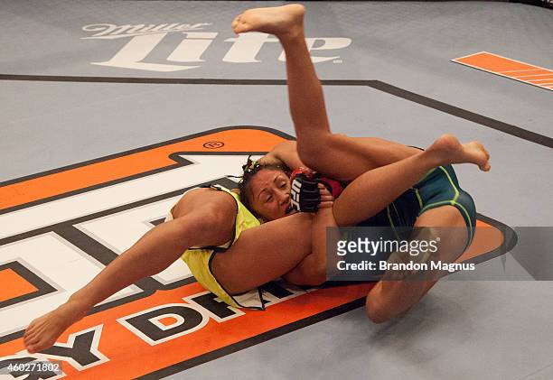 Team Pettis fighter Carla Esparza takes down team Pettis fighter Jessica Penne during filming of season twenty of The Ultimate Fighter on August 14,...