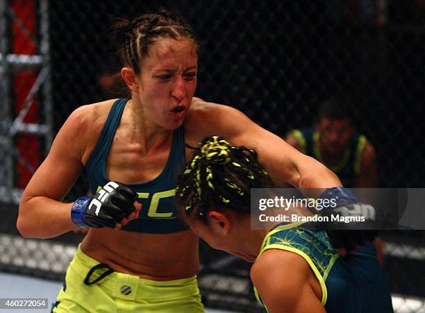 Team Pettis fighter Jessica Penne punches team Pettis fighter Carla Esparza during filming of season twenty of The Ultimate Fighter on August 14,...