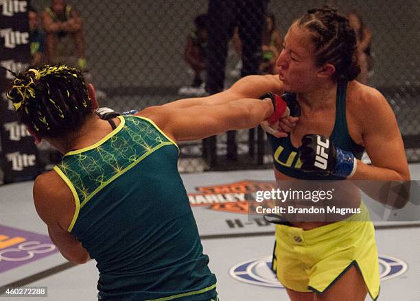 Team Pettis fighter Jessica Penne exchanges punches with team Pettis fighter Carla Esparza during filming of season twenty of The Ultimate Fighter on...