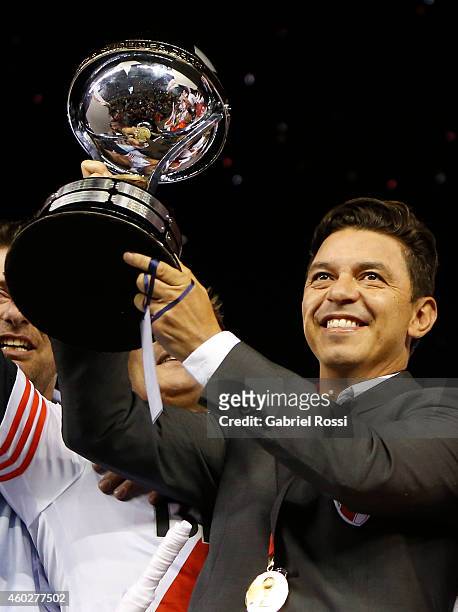 Marcelo Gallardo, coach of River Plate celebrates with the trophy after wining the second leg final match between River Plate and Atletico Nacional...