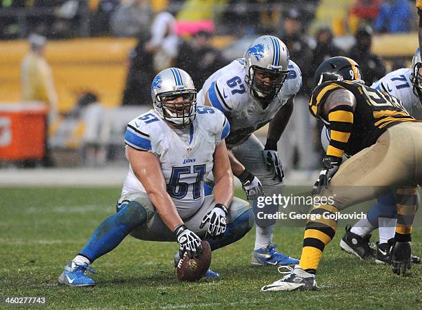 Center Dominic Raiola and guard Rob Sims of the Detroit Lions look on from the line of scrimmage during a game against the Pittsburgh Steelers at...