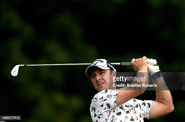 Brendan Jones of Australia plays a shot on the fourth hole during day one of the 2014 Australian PGA Championship at Royal Pines Resort on December...