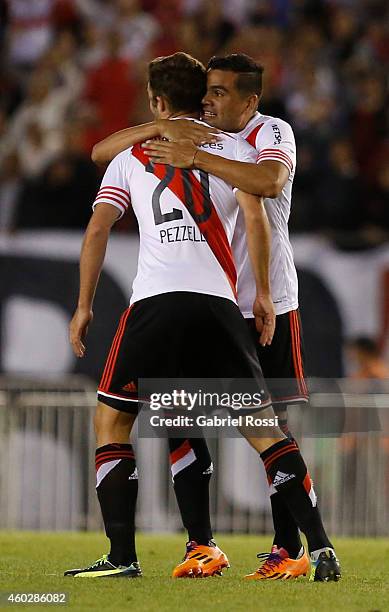 German Pezzella and Gabriel Mercado of River Plate celebrate after scoring the second goal of his team during a second leg final match between River...