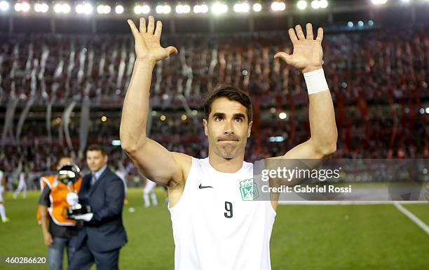Juan Pablo Angel of Atletico Nacional and former player of River Plate greets the fans before a second leg final match between River Plate and...