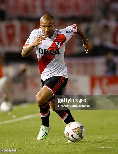 Carlos Sanchez of River Plate drives the ball during a second leg final match between River Plate and Atletico Nacional as part of Copa Total...