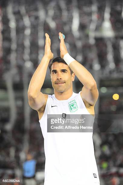 Juan Pablo Angel of Atletico Nacional and former player of River Plate greets fans of River Plate before a second leg final match between River Plate...
