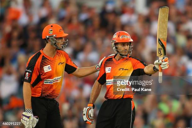Simon Katich of the Scorchers celebrates his half century with Mitch Marsh during the Big Bash League match between the Perth Scorchers and Sydney...