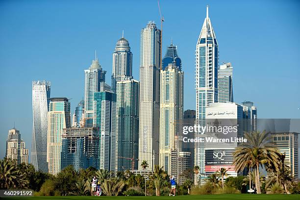 Shanshan Feng of China plays her second shot into the 1t3th green during the second round of the Omega Dubai Ladies Masters on the Majlis Course at...