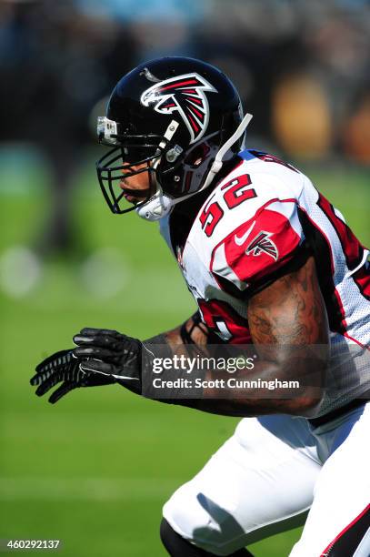 Akeem Dent of the Atlanta Falcons warms up before the game against the Carolina Panthers at Bank of America Stadium on November 3, 2013 in Charlotte,...