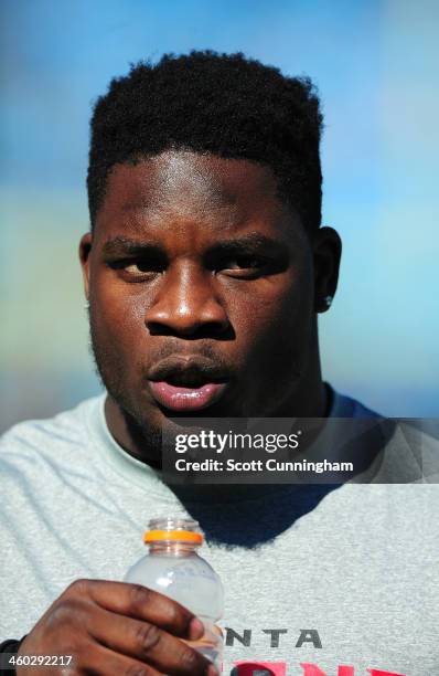 Sean Weatherspoon of the Atlanta Falcons warms up before the game against the Carolina Panthers at Bank of America Stadium on November 3, 2013 in...