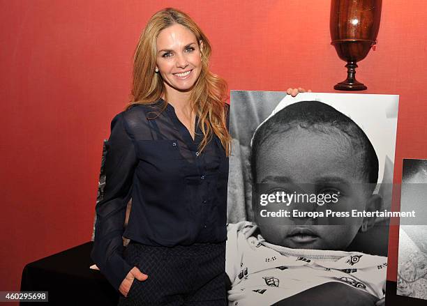 Genoveva Casanova attends her "No Blink" Humanitarian Photography Exhibition opening at Equestrian Circle Club on December 10, 2014 in Barcelona,...