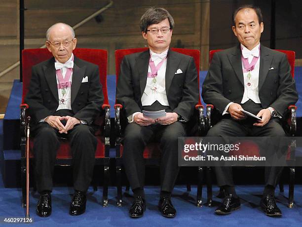 Nobel Prize in Physics laureates Isamu Akasaki, Hiroshi Amano and Shuji Nakamura are seen during the Nobel Prize Awards Ceremony at Concert Hall on...