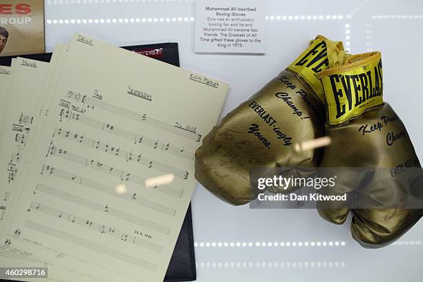 Pair of boxing gloves presented to Elvis Presleys by Muhammad Ali in 1963 are is displayed during a press call at the 'Elvis at the O2, The...