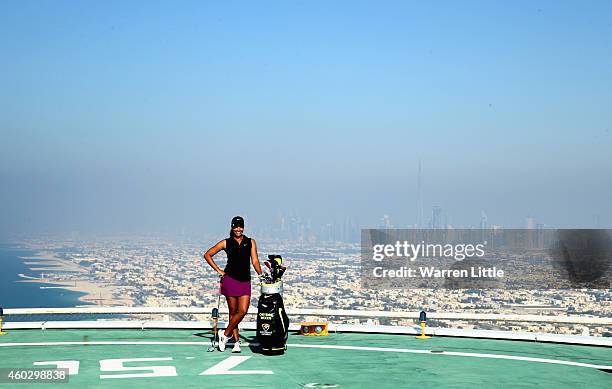 Cheyenne Woods of the USA poses for a picture on the heli-pad on top of the Burj Al Arab Hotel after her second round of the Omega Dubai Ladies...