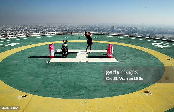 Cheyenne Woods of the USA poses for a picture on the heli-pad on top of the Burj Al Arab Hotel after her second round of the Omega Dubai Ladies...