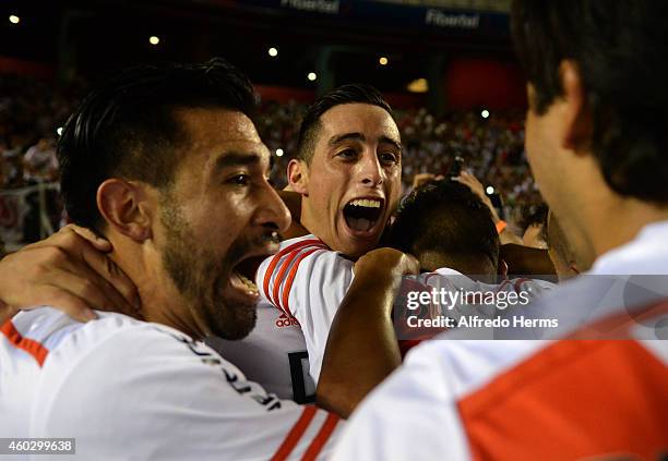 Ramiro Funes Mori of River Plate celebrates with Ariel Rojas and teammates the second goal of his team scored by German Pezzella during a second leg...